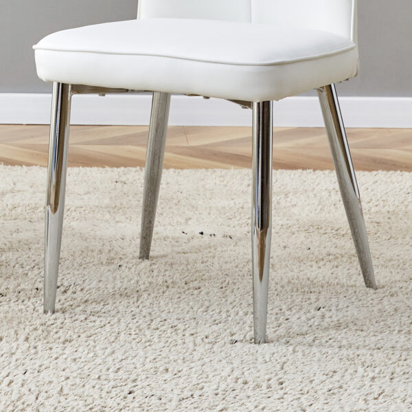 8699d771533d43fdb478d3e99dcb6202_34439d60734860145873282701aa4db2 Table and chair set.63"x31.5x30" Black Marble-Patterned Slabs Tabletop with Stainless Steel Butterfly Legs.Paired with 4 white PU dining chairs with a vertical stripe design on the backrest.