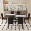 Table and chair set.71*35.4 inch White And Black Spliced Dining Table With Storage Function In The Middle Of The Table Legs.Paired With 6 Black PU Dining Chairs, Simple And Versatile.