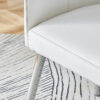 Table and chair set.63"*35.4" White Imitation Marble Pattern MDF Dining Table Set - 4 White PU Chairs with a vertical stripe design on the backrest.Create Your Exclusive Low-Key Luxury Space.
