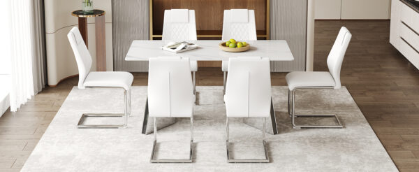 89e7d21c8ee340d2b87deb0e3c034e3c_8b9c1c8606801c5463f767fb1b910bf7 Table and chair set.63"x31.5x30" Luxurious Snow Mountain Patterned Sintered Stone Table with Silver Stainless Steel Butterfly Legs.Paried With 6 White High-quality PU Chairs With Arched Metal Legs.