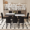 Table and chair set.71*35.4 inch White And Black Spliced Dining Table With Storage Function In The Middle Of The Table Legs.Paired With 8 Black PU Dining Chairs, Simple And Versatile.