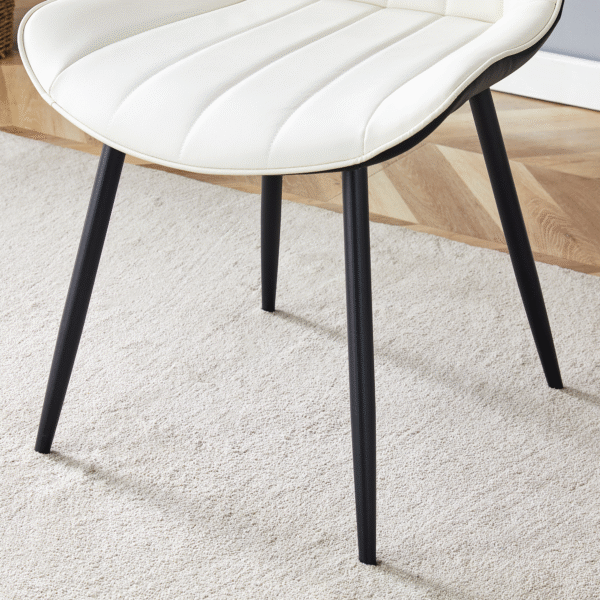 8b91f1f3af4b4e45b739be693caa8ffa_d063c08e0b9e70a04058c64a42eb19dd Extended Seat Cushion PU Dining Chair Set - Four Pieces.Smooth line design.Can integrate well into various modern home decoration styles.White and Black Splicing Colors.