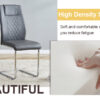 Table and chair set.63"x31.5x30" Luxurious Pandora patterned Sintered Stone Tabletop with Silver Stainless Steel Butterfly Legs.Paried With 4 Dark Gray High-quality PU Chairs With Arched Metal Legs.