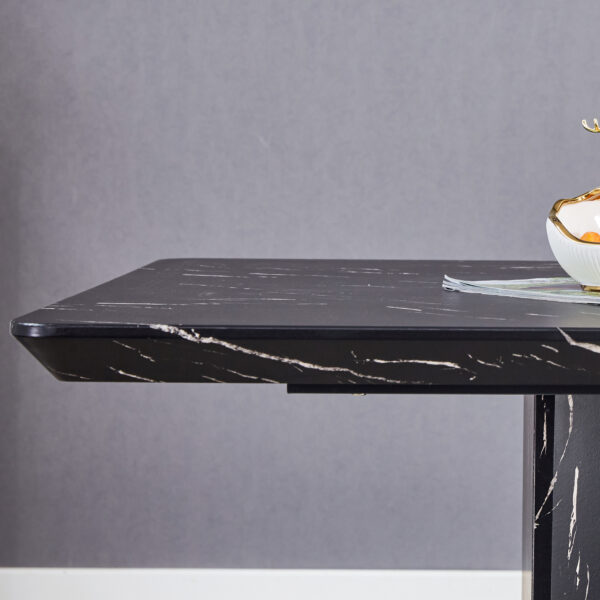 This modern dining table with MDF marbled design gives you a luxurious and elegant feel, adding a touch of elegance whether it is a family dinner or entertaining guests.