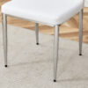 Table and chair set.Modern circular transparent tempered glass table, tempered glass tabletop, silver metal table legs.A Set of 4 White PU Comfort Dining Chairs with extended backrest.