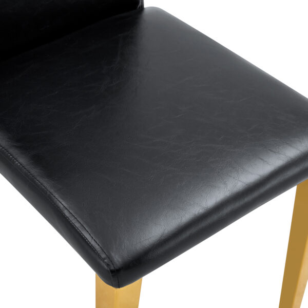 8f8581710daf4fbd9cbea277a999ce5f_dc975a02d4045a2851e21c241fc0b7cb Table and chair set.71 * 35.4 inch rectangular dining table.Tempered Glass Tabletop,Golden 7-shaped Metal Table Legs.Paried With 8 Black PU dining chairs, Golden Metal Legs.Simple and versatile.
