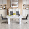 Table and chair set.64.5 x 35.4 Inch Stylish White Marble Textured Dining Table,Perfectly Blending Simplicity And Transparency.Paried With 4 Dark Gray High-quality PU Chairs With Arched Metal Legs.