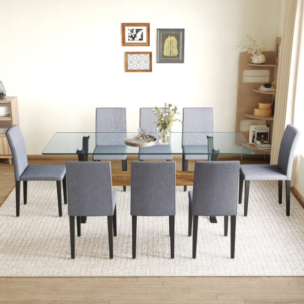 90281dbc43d04215aa12b39e29f52498_4900d72f8247899ab4adfd076e0f4e17 Table and chair set.79"x31.5" Inch Tempered Glass Tabletop With X-shaped Black Metal Table Legs,Wood Grain Textured MDF Crossbeam.Paired With 8 Light Gray Linen-Cotton Dining Chairs.