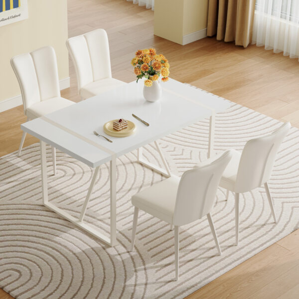 912f227377d74f089ccdb80e3feb521d_6fff07665353e59c68a89e1e2d71445f 55"x31.5"Cream-Style White MDF Dining Table Set with 4 Armless Chairs.MDF Tabletop and metal legs.The backrest of the dining chair has a vertical line design.Adding a warm atmosphere to your family.