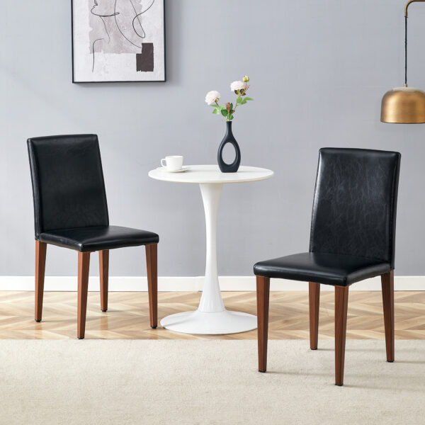 925a65e140e346b6afc6a78d2d43fdef_b74d200bb267f0861007f57223994ef3 Two black PU dining chairs, simple and versatile, comfortable and accompanied. The exquisite and multifunctional dining chair has opened up a comfortable new experience. (2-piece set)