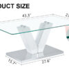 Modern minimalist coffee table. Transparent tempered glass tabletop with silver MDF pillars. Suitable for living room and dining room
