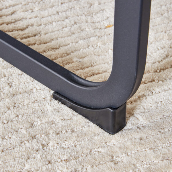 Table and chair set.A retro rectangular dining table with fishbone patterned MDF desktop and black metal legs.Paired With 6 Brown technology fabric chairs with Featuring arched black legs.