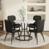 Table and chair set.A Modern Minimalist Circular Dining Table With A Diameter Of 33.3 Inches.Paired With 4 Black Minimalist Ergonomic PU Dining Chairs With Extended And Curved Seat Cushions.