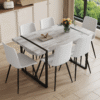 Table and chair set.A minimalist retro rectangular dining table with a specially textured top and black metal legs.Paired With 6 White Artificial PU Chairs With Curved Widened Cushion Design.