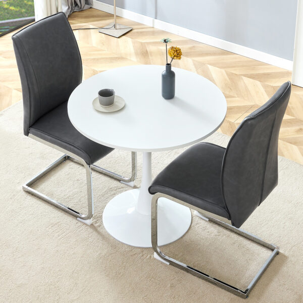 9b2667f661dc452da9b32ee0bf9f8685_7cbbb28fa0f1f26fb9d88f507c9e53ba Table and chair set.Hourglass-Shaped Stable Small Round Table -31.9" * 31.9" With 2 Soft and Comfortable Dark Gray PU Chair With Arched Metal Silver Leg.Create Your Exclusive Low-Key Luxury Space.