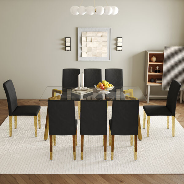 9b99c65f9fd843cc9ab8be53d8121d5f_948d70b6b3372da47a0aa7b1fc75fe96 Table and chair set.71 * 35.4 inch rectangular dining table.Tempered Glass Tabletop,Golden 7-shaped Metal Table Legs.Paried With 8 Black PU dining chairs, Golden Metal Legs.Simple and versatile.