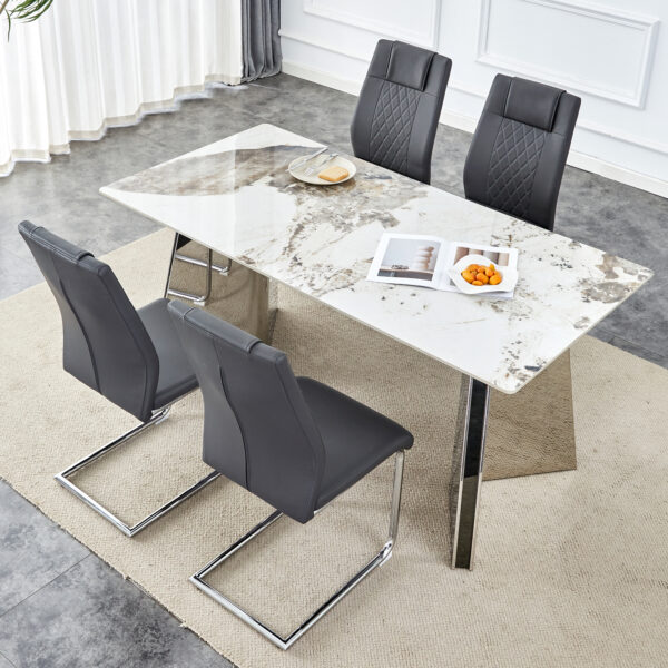 9d543716034146d09e047ca876cd4364_2f1321b02678129699c47540413c8a2a Table and chair set.63"x31.5x30" Luxurious Pandora patterned Sintered Stone Tabletop with Silver Stainless Steel Butterfly Legs.Paried With 4 Dark Gray High-quality PU Chairs With Arched Metal Legs.