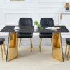 Table and chair set.63"x31.5x30"Black Texture With Lines Patterned Sintered Stone Table with Golden Stainless Steel Legs.Paried With 4 Black PU Chairs with Simple Line Designs On The Backrest.