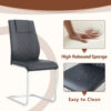 Table and chair set.63"x31.5x30" Luxurious Snow Mountain Patterned Sintered Stone Table with Silver Stainless Steel Butterfly Legs.Paried With 6 Black High-quality PU Chairs With Arched Metal Legs.