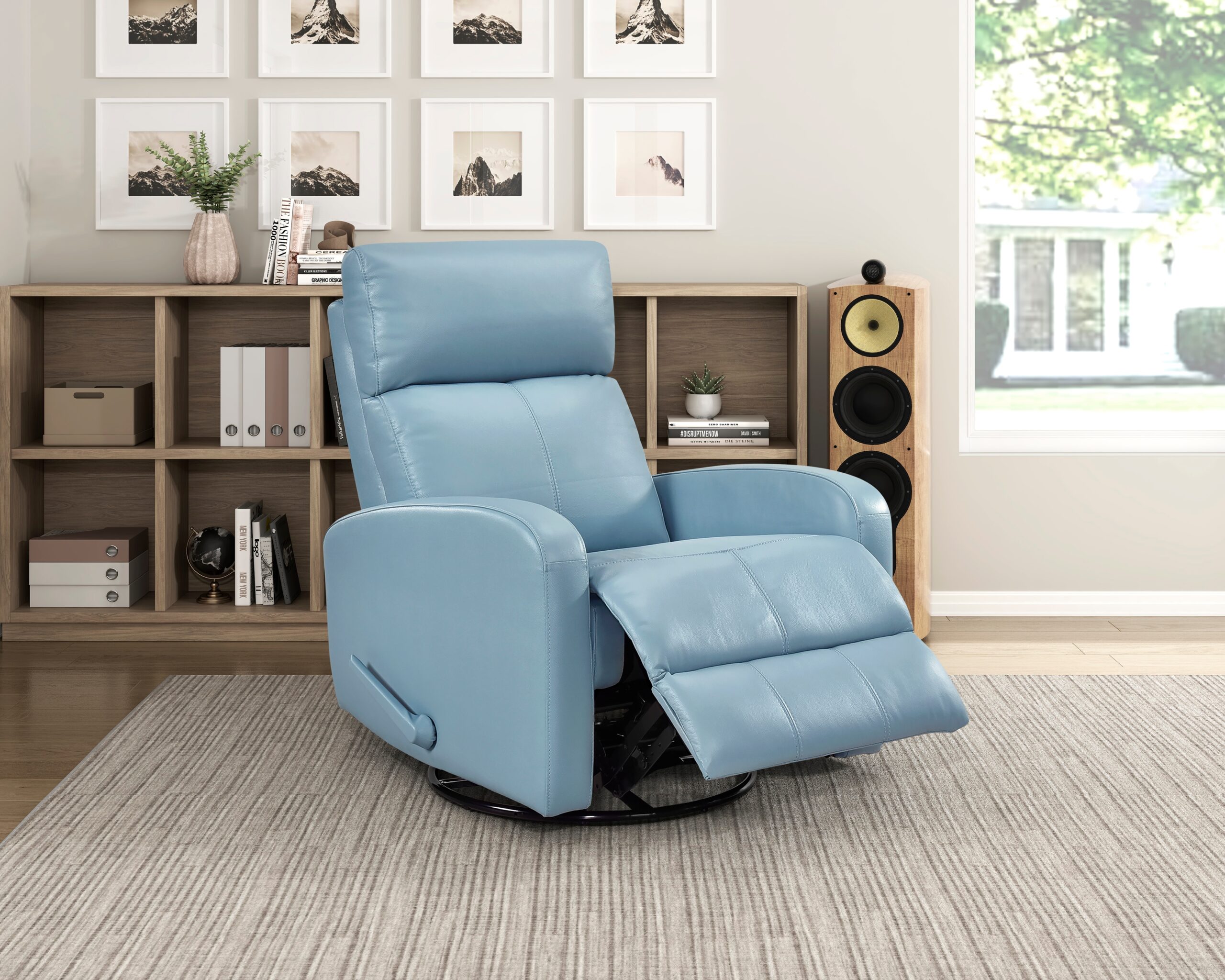 Blue leather glider recliner chair with swivel motion in a cozy living room setting
