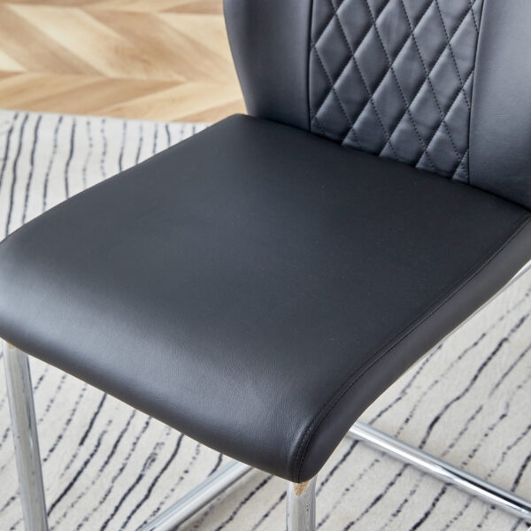 a26a28491d1f479dad897d40544ddf81_3e1d6046b0ca43fc8fd7e26b79ee9a8d Table and chair set.71 * 35.4 inch rectangular dining table.Tempered Glass Tabletop,Silver 7-shaped Metal Table Legs.Paried With 6 Black High-quality PU Chairs With Arched Metal Legs.