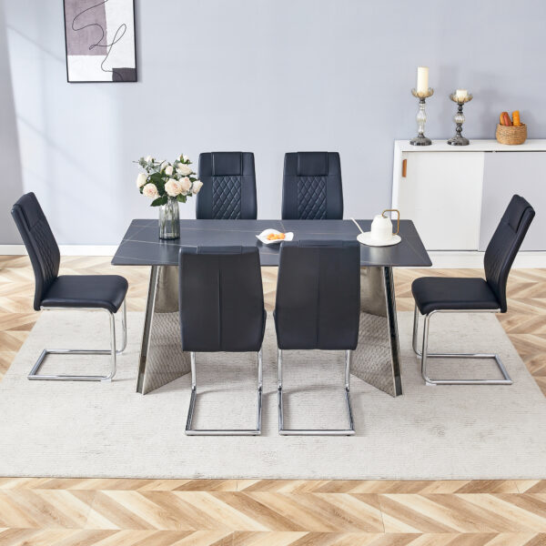 a44ea43b2f9d40c3a89deb1617f8c9c6_3eaadb7efc277ee7af7626a49b740323 Table and chair set.63"x31.5x30" Black Marble-Patterned Slabs Tabletop with Stainless Steel Butterfly Legs.Paried with 6 Black high-quality PU chairs with silver metal legs.