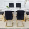 Table and chair set.63"x31.5x30" Luxurious Cold Jade Patterned Sintered Stone Dining Table with Golden Stainless Steel Butterfly Legs.Paried With 6 Black High-quality PU Chairs With Arched Metal Legs.