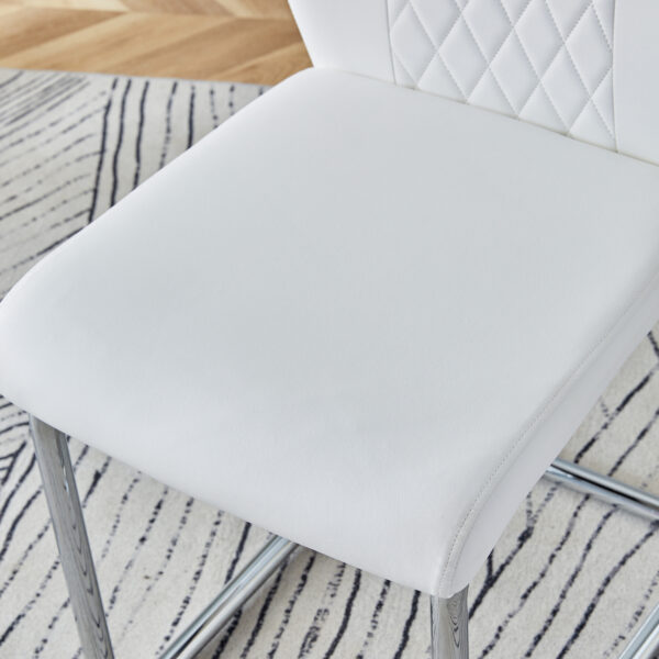 a7fcc12d48d34a8a98116c59c4f90963_30c798464e354513f294baf428d20b1d Table and chair set.63"x31.5x30" Black Marble-Patterned Slabs Tabletop with Stainless Steel Butterfly Legs.Paried with 6 White high-quality PU chairs with silver metal legs.