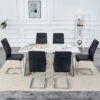 Table and chair set.63"x31.5x30" Luxurious Pandora patterned Sintered Stone Tabletop with Silver Stainless Steel Butterfly Legs.Paried With 6 Black High-quality PU Chairs With Arched Metal Legs.