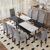 Table and chair set.71*35.4 inch White And Black Spliced Dining Table With Storage Function In The Middle Of The Table Legs.Paired With 8 Light Gray Linen-Cotton Dining Chairs, Simple And Versatile.