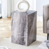 Elevate your living space with this modern MDF coffee table, which showcases gray textured patterns. It is characterized by stylish design.