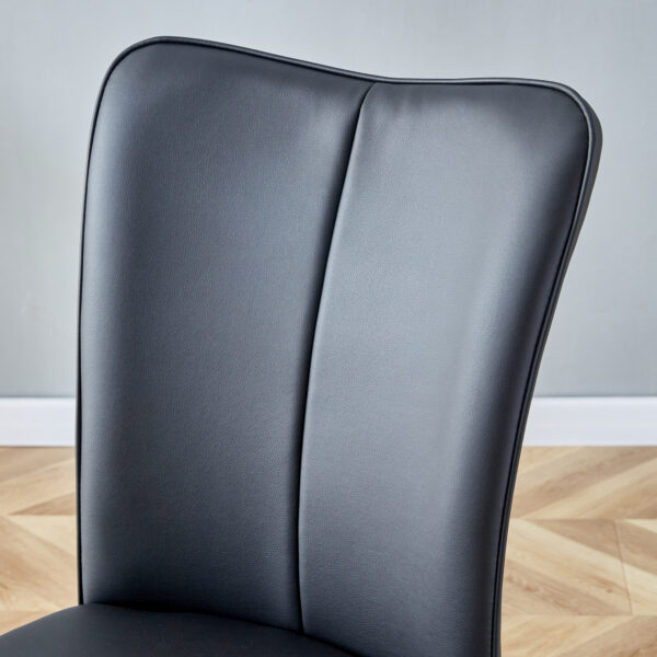 adc4d696f1fd462bb0b6c57b08206498_943fe10e2f02be13e30792897597c4b5 Table and chair set.63"x31.5x30" Black Marble-Patterned Slabs Tabletop with Stainless Steel Butterfly Legs.Paired with 4 Black PU dining chairs with a vertical stripe design on the backrest.