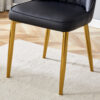 Table and chair set.Luxurious Style Tempered Glass Dining Set-71"x35.4"with 8 Black PU Chairs with Simple Line Designs On The Backrest .Golden Metal Legs.Tempered Glass Top With White Texture sticker.