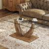 Modern minimalist transparent tempered glass coffee table with wooden MDF legs and stainless steel decorative columns. Computer desk. Game table. CT-907