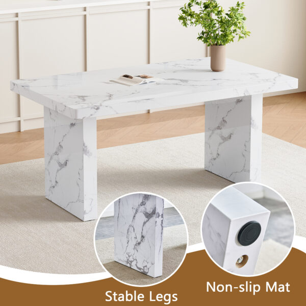 b556eddfcc6f49c1bd7e5e0fbe0ba8b4_ad7dd79f8295e83e28dc19bad2d3a205 Table and chair set.63"*35.4" White Imitation Marble Pattern MDF Dining Table Set - 4 Soft and Comfortable Dark Gray PU Chair With Arched Metal Silver Leg.Create Your Exclusive Low-Key Luxury Space.