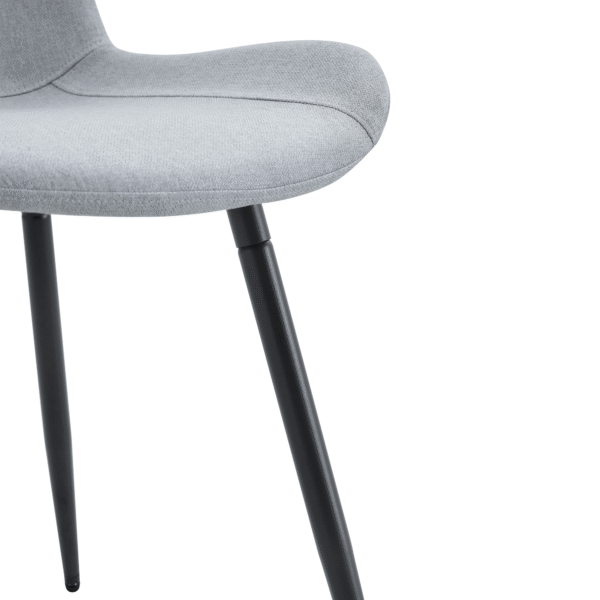 ba7bf09940dd48ceb191656b1ed8492b_172033a1a50e8283604cb679a0b98cb3 Table and chair set.71*35.4 inch White And Black Spliced Dining Table With Storage Function In The Middle Of The Table Legs.Paired With 6 Light Gray Linen Dining Chairs With Curved Widened Cushion.