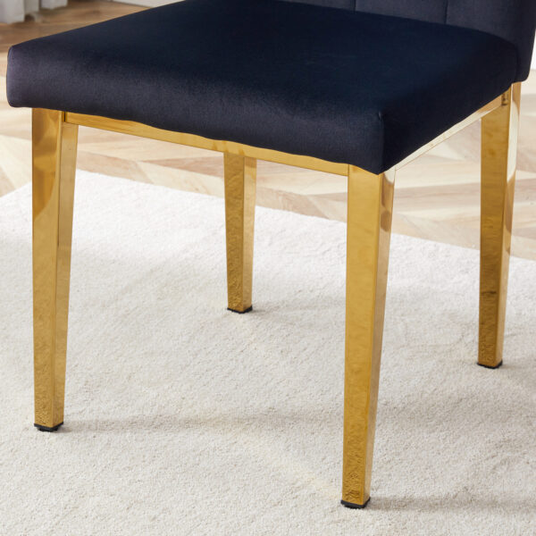 ba8e0fc47ea1491dbca22921e6c03d4d_52539e1a08ca23abbb09480e9730eec4 4 piece dining chairs.The gold metal legs complement the black velvet, showcasing a perfect blend of modern and classic elements.Suitable for various occasions such as kitchens,conference rooms, etc.