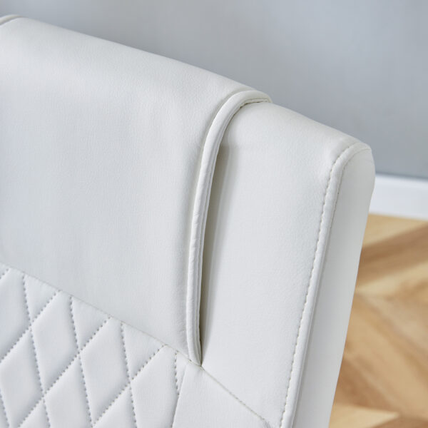 bb9d1a813c884fc29ec1381bc01569e5_b522494b483c2e1e711fbbeaff644db2 Table and chair set.63"x31.5x30" Luxurious Snow Mountain Patterned Sintered Stone Table with Silver Stainless Steel Butterfly Legs.Paried With 6 White High-quality PU Chairs With Arched Metal Legs.