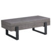 A rustic gray wood grain MDF coffee table with black metal legs - an elegant space in natural wood tones