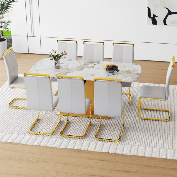 Table and chair set.71"x35.4"x30" Luxurious Pandora Patterned Glass Dining Tabletop with Golden Back To Back C-Shaped MDF Legs.Paried With 8 Light Gray PU Chairs with golden C-tube metal leg.