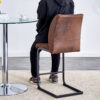 A set of two brown chairs, including suede cushions and black metal legs. Small size, suitable for select groups, suitable for dining room, kitchen, terrace and guest office chairs (set of 2)