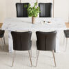 Table and chair set.63"*35.4" White Imitation Marble Pattern MDF Dining Table Set - 6 Black PU Chairs with a vertical stripe design on the backrest.Create Your Exclusive Low-Key Luxury Space.