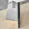 63"x31.5x30" Luxurious Snow Mountain Stone Sintered Stone Dining Table with Silver Stainless Steel Butterfly Legs.The tabletop is designed to be scratch and heat resistant.