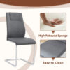 Table and chair set.63"x31.5x30" Luxurious Snow Mountain Patterned Sintered Stone Table with Silver Metal Butterfly Legs.Paried With 4 Dark Gray High-quality PU Chairs With Arched Metal Legs.