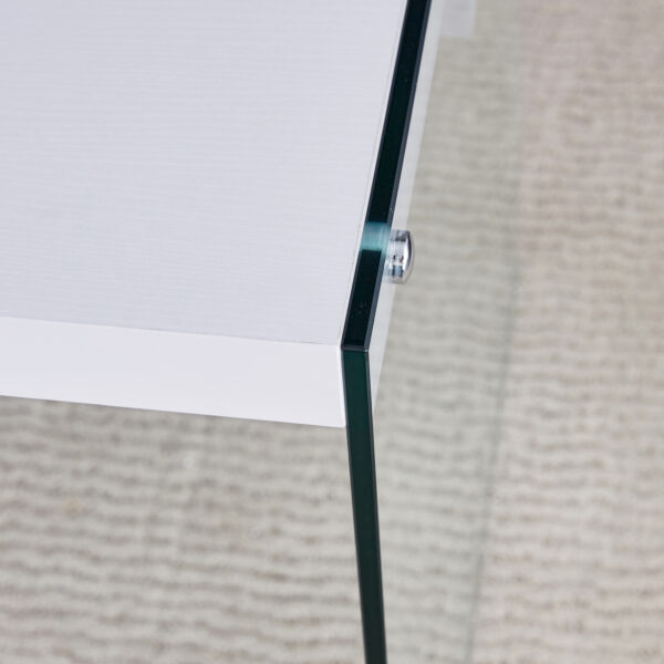 c0c6e621cd344a7abc15b8264ee39ef4_10c5bd27ffd44508c1cbc111247ca8cd The top of the coffee table is made of MDF and white stickers, and the sides are clear tempered glass. The design is simple and elegant, and the structure is strong.