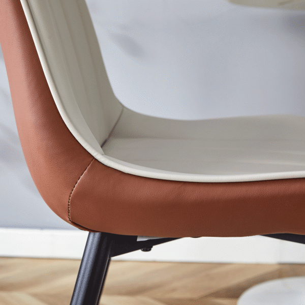 c20e3f4fd33c44c39eb53404aaa5d319_f9094f455520c5209accc5ac1f1b6577 Extended Seat Cushion PU Dining Chair Set - Four Pieces.Smooth line design,Integral metal leg structure,Can integrate well into various modern home decoration styles.Gray and Brown Splicing Colors.