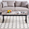 A coffee table is made of rock slab material, with a natural and smooth marble pattern on the surface, which complements the modern design of the black metal legs and adds a touch of fashion.47*23.6