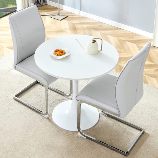 c3f673aea837440faa02fe5320531c1f_e64778ae4036f905d3a881c97cfe9af8 Table and chair set.Hourglass-Shaped Stable Small Round Table -31.9" * 31.9" With 2 Soft and Comfortable Light Gray PU Chair With Arched Metal Silver Leg.Create Your Exclusive Low-Key Luxury Space.