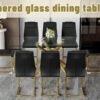 Table and chair set.Modern Luxurious Transparent Tempered Glass Dining Table Set with 8 Chairs.Single Fork Golden Metal Table Legs.Black high-quality PU dining chairs with golden metal legs.