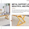 A coffee table is made of rock slab material, with a natural and smooth marble pattern on the surface, which complements the modern design of the golden metal legs and adds a touch of fashion.47*23.6